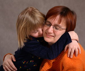 Mother with female child with Downs syndrome - ASAH's Commitment to Parents