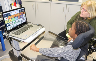 NJEDDA student working at a computer with special technology